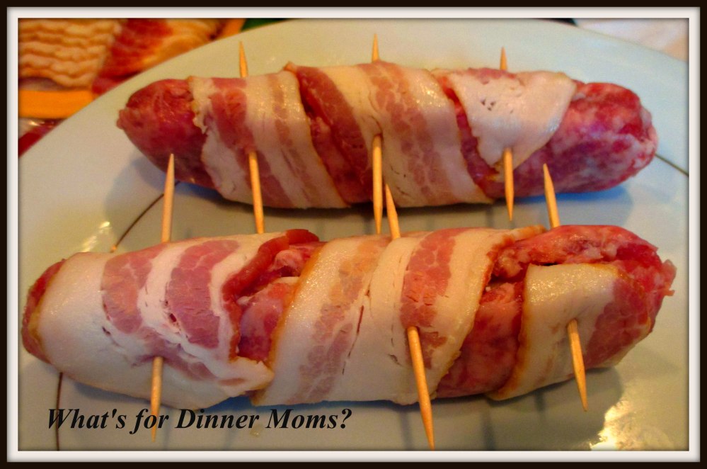 Grilled Basile Farmer Cheese Stuffed Brats Wrapped in Bacon (raw)